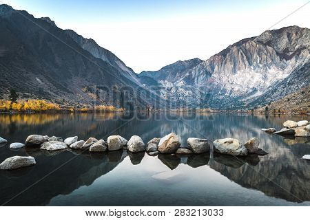 Long Exposure Sunrise Photo Of Convict Lake, An Alpine Lake In The Sierra Nevada Mountains Of Califo