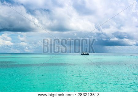 Traditional Maldivian Wooden Boat Dhoni In The Indian Ocean, Maldives