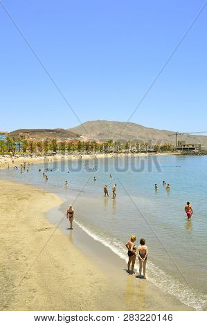 Playa De Las Americas Beach, Tenerife, Canary Islands, Spain, Europe - June 12, 2016 : Tourists On P