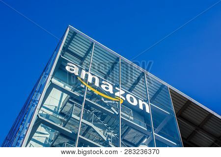 Munich, Germany - December 26, 2018: Amazon Logo At The Company Office Building Located In Munich, G