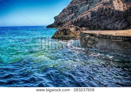 Blue Caves On The Sea In Zakynthos In Greece. Clear Water Of Medditerian Sea In Sunny Day At Summer.