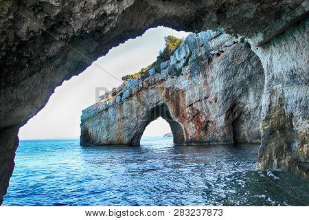 Blue Caves On The Sea In Zakynthos In Greece. Clear Water Of Medditerian Sea In Sunny Day At Summer.