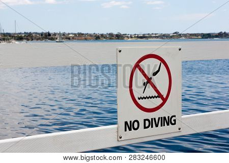 No Diving Signage In-front Of Bay Waters