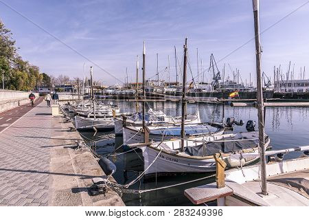 Moored Boats Along The Paseo Maritimo On A Sunny Winter Day