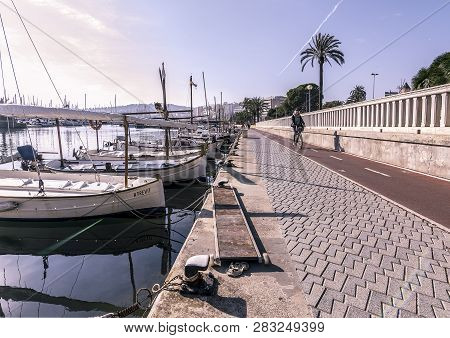 Moored Boats Along The Paseo Maritimo On A Sunny Winter Day