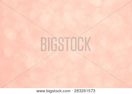 Coral Blurry Abstract Background. Bokeh Lights Toned In Trendy Pastel Color