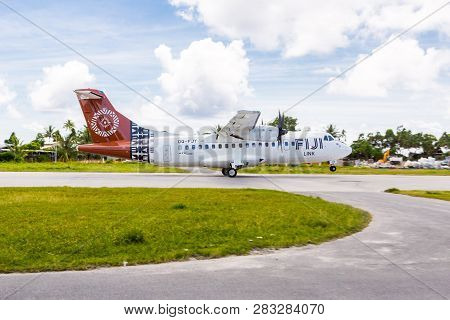 Vaiaku Village, Tuvalu - Dec 27, 2014: Fiji Link Atr 42-600 Airplane Departing From Tuvalu Internati