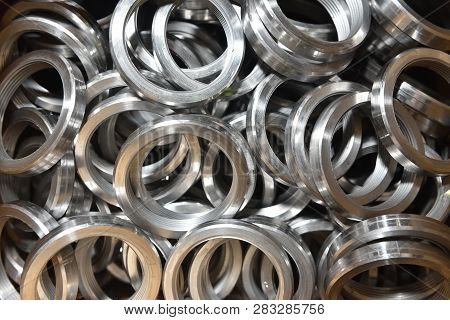 Round Rings With Internal Thread For Valve Manufacture In The Factory. Many Round Rings For Industri