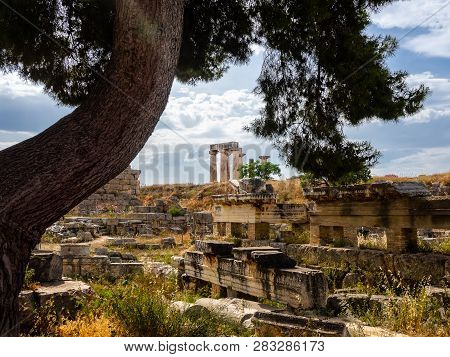 Ruins Of Ancient City Of Corinth And Temple Of Apollo Shot At Serene Daytime