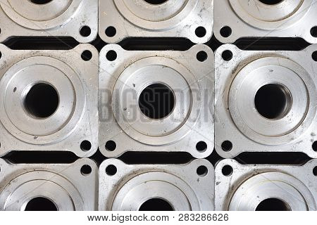 Square Metal Part And Base For Valve Creation. The Metal Part Machined On The Milling Machine And Th