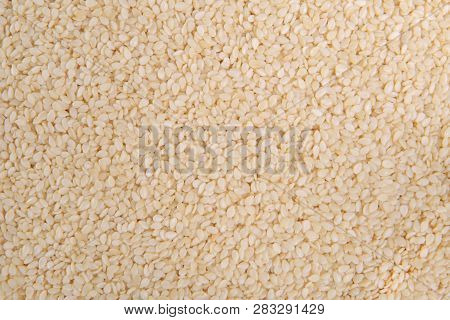 Sesame Seeds. Top View. Food Background. A Scattering Of Sesam Seeds. Healthy Food. Natural Food.