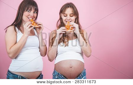Nutrition Concept, Pregnant Women Eating Pizza On A Pink Background