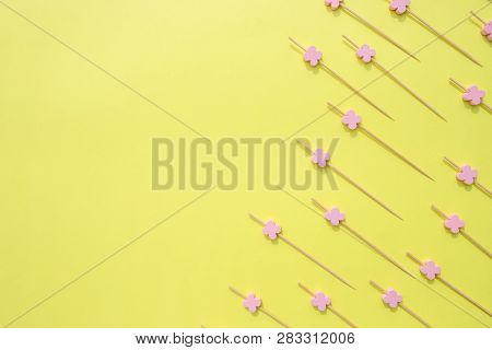 The Skewer For Design Background, Art Pattern, Uellow Background. Copy Space. Kitchen Utensils. Pile