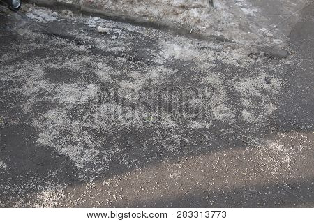 Deicing Chemicals On Asphalt Road In Moscow