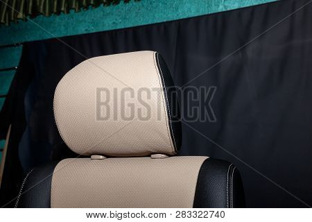 Headrest Of Front Seat With Combined Leather Trim In Two Colors Of Black And Beige, Located On The W