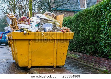 Massive Container Full Of Bulky Waste, Pile Of Garbage, Recycling Concept