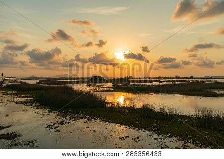 Sunset At The Long Bridge Across Wetland The Talay Noi Wetlands Preserve In Phatthalung At 450 Squar