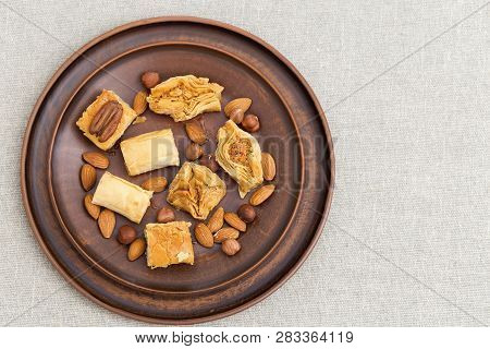 Traditional Assortment Of Oriental Sweets With Chopped Nuts And Honey. Delicious Middle Eastern Hone