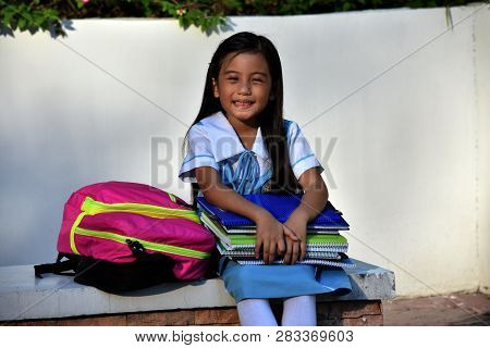 Smiling Catholic Minority Female Student Wearing School Uniform