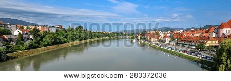 Maribor, Slovenia - May 20, 2018: Panorama Of Maribor City, Slovenia. Drava River, Buildings And Alp