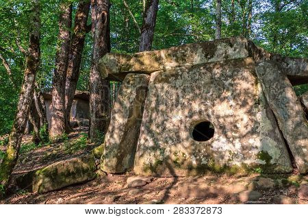 Big Stone Pshada Dolmen In Summer Caucasus Mountain Forest On Sunny Day. Ancient Megalithic Tomb Wit
