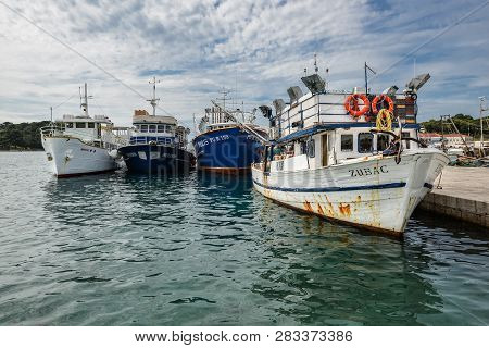 Vrsar, Croatia - May 22, 2018: View On Yacht, Harbor, Adriatic Sea And Small Croatian Town Vrsar, Cr