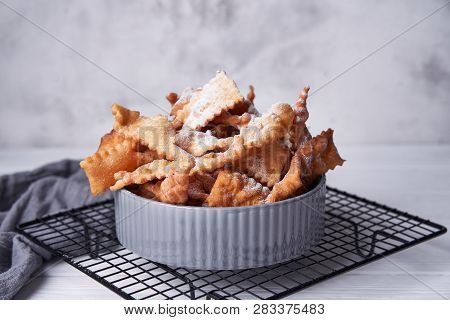 Brushwood - Russian Traditional Cookies With Powdered Sugar. Food Consept. Plate With Hvorost On Whi