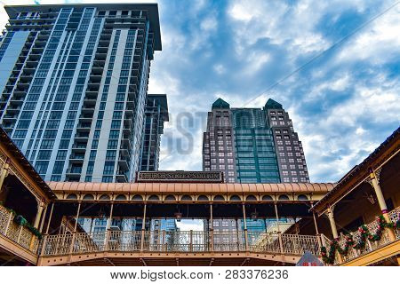 Orlando, Florida . December 24, 2018. Modern And Vintage Buildings On Lightblue Sky Cloudy Backgroun