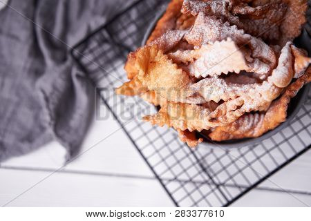 Brushwood - Russian Traditional Cookies With Powdered Sugar. Food Consept. Plate With Hvorost On Whi