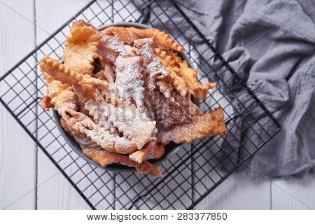 Brushwood - Russian Traditional Cookies With Powdered Sugar. Food Consept. Plate With Hvorost On Whi