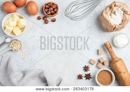 Baking Ingredients And Utensils On Concrete Background. Cooking Or Baking Cake, Cookies, Pastry Or B