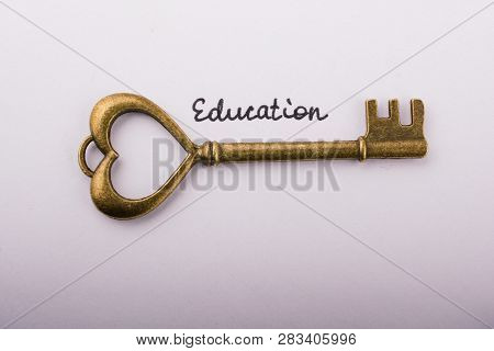 Education Wording Beside A Retro Style Key  As Education Concpt