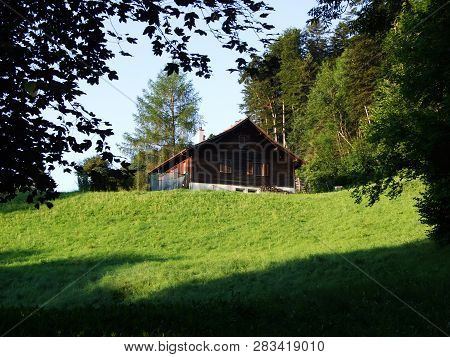 Alpine Livestock Farms And Stables On The Slopes Of Alvier Mountain In The Appenzell Alps Mountain R