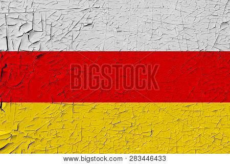 South Ossetia Painted Flag. Patriotic Old Grunge Background. National Flag Of South Ossetia