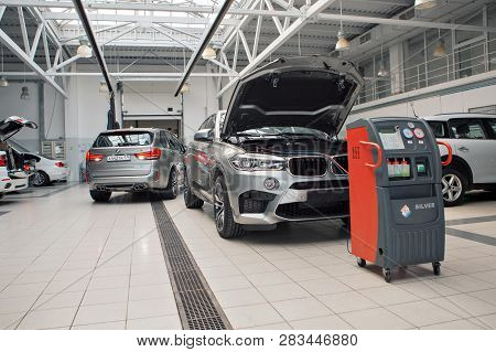 Car Repair, Bmw Advertising, Moscow, 1.11.2018: Bmw Motor Company Badge On The Front From A Black Ca