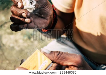 Varanasi India November 19, 2018 View Of A Unknown Sadhu Smoking A Chillum In The Streets Of Varanas