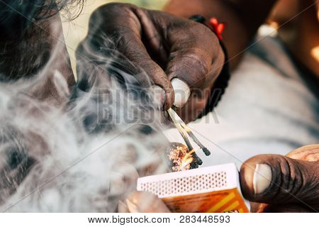 Varanasi India November 19, 2018 View Of A Unknown Sadhu Smoking A Chillum In The Streets Of Varanas