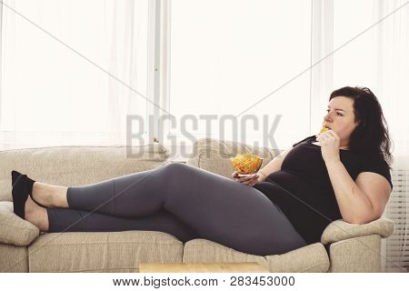 Lack Of Physical Activity, Sedentariness, Imbalanced Nutrition, Laziness, Homebody. Fat Woman Overea