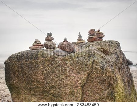 Stack Of Pebble Stone On Shingle Beach. Pile Of Stacked Stones On The Beach, Colorful Pebles Coast.