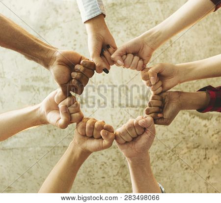 Group Of People Making Fist Bump. People Solidaruty Concept