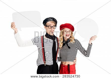 Happy French Couple Holding Empty Speech Buubles Isolated On White