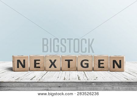 Nextgen Sign On A Plank Desk With A Cyan Wall In The Background