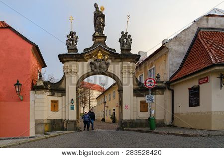Prague, Czech Republic - January 22, 2019: Baroque Gate With Sculpture Of St. Norbert, Founder Of Pr