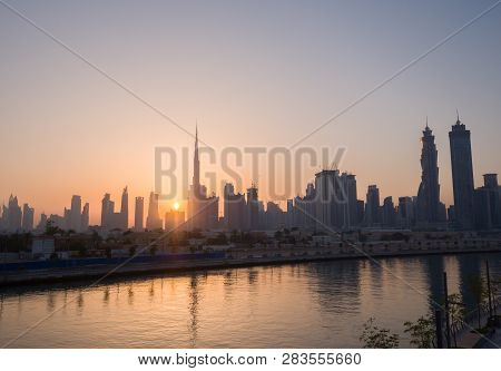 Panorama Of The City Of Dubai Early In The Morning At Sunrise With A Bridge Over The City Channel Du