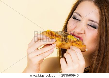 Woman Eating Hot Pizza Slice