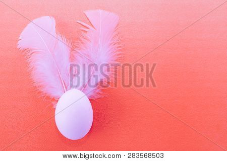 Easter Egg With White Feathers. Colorful Easter Background . Easter Postcard