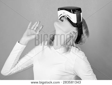 Person With Virtual Reality Helmet Isolated On Green Background. Woman With Virtual Reality Headset.