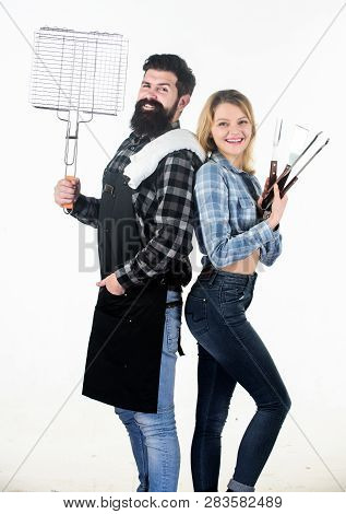 Bearded Hipster And Girl Ready For Barbecue Party. Roasting And Grilling Food. Couple In Love Hold C