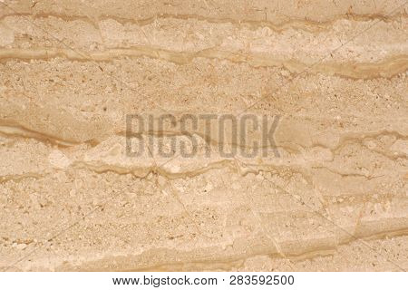 Beige Marble With Striped Patterns On The Surface, Called Travertino Alabastrino