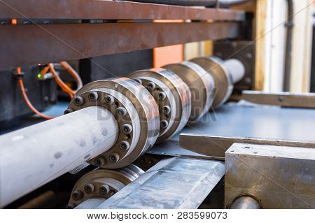 Roller Forming Machine. The Interior Of The Plant Producing A Metal Profile. Sheet Metal Processing.